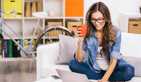 Woman on laptop doing tutoring