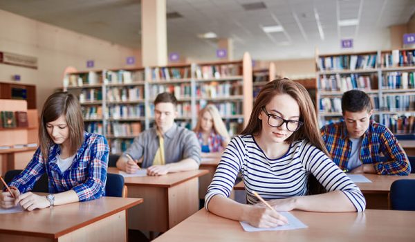 Students in classroom taking a test