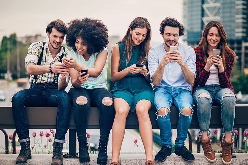 Group of students on cellphones