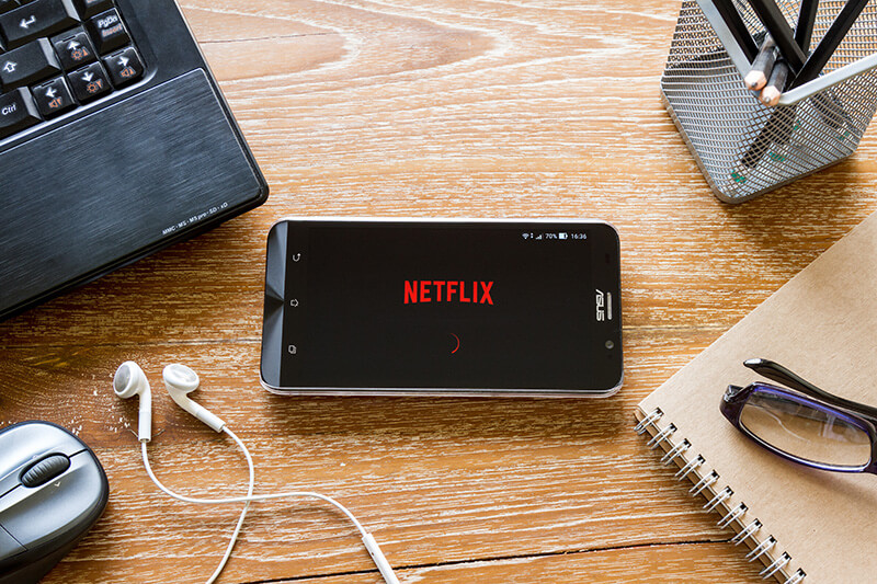 Student desk with Netflix app open