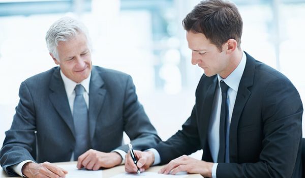 Young man trying to impress a new boss on his first day at work