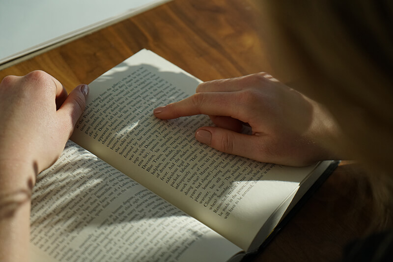 Woman reads a book