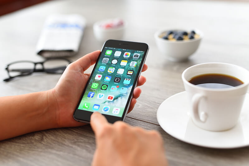 University life showing student using an Apple iPhone