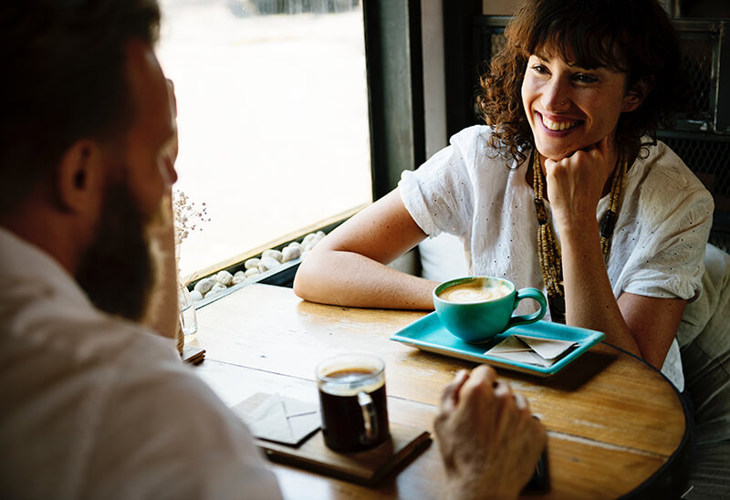 Happy and engaging conversation between a man and woman