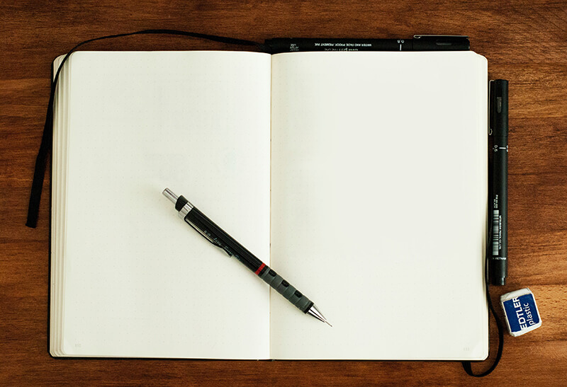 A student’s blank notebook as they figure out how to write an essay