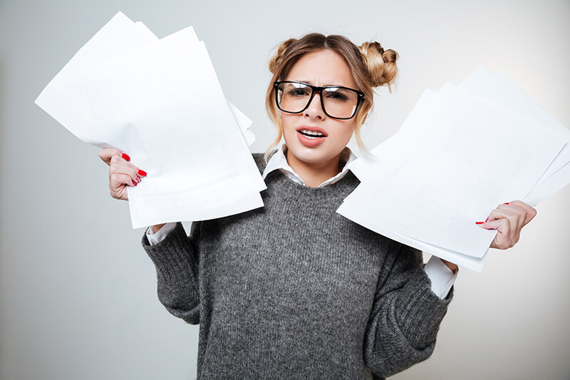 Female Student Choosing a Topic For Paper