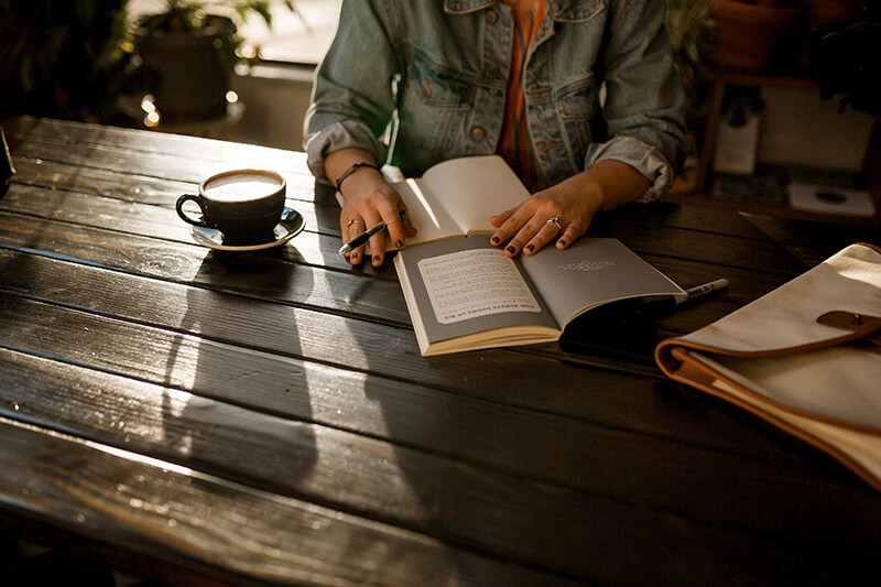 Female student learning how to summarize an article