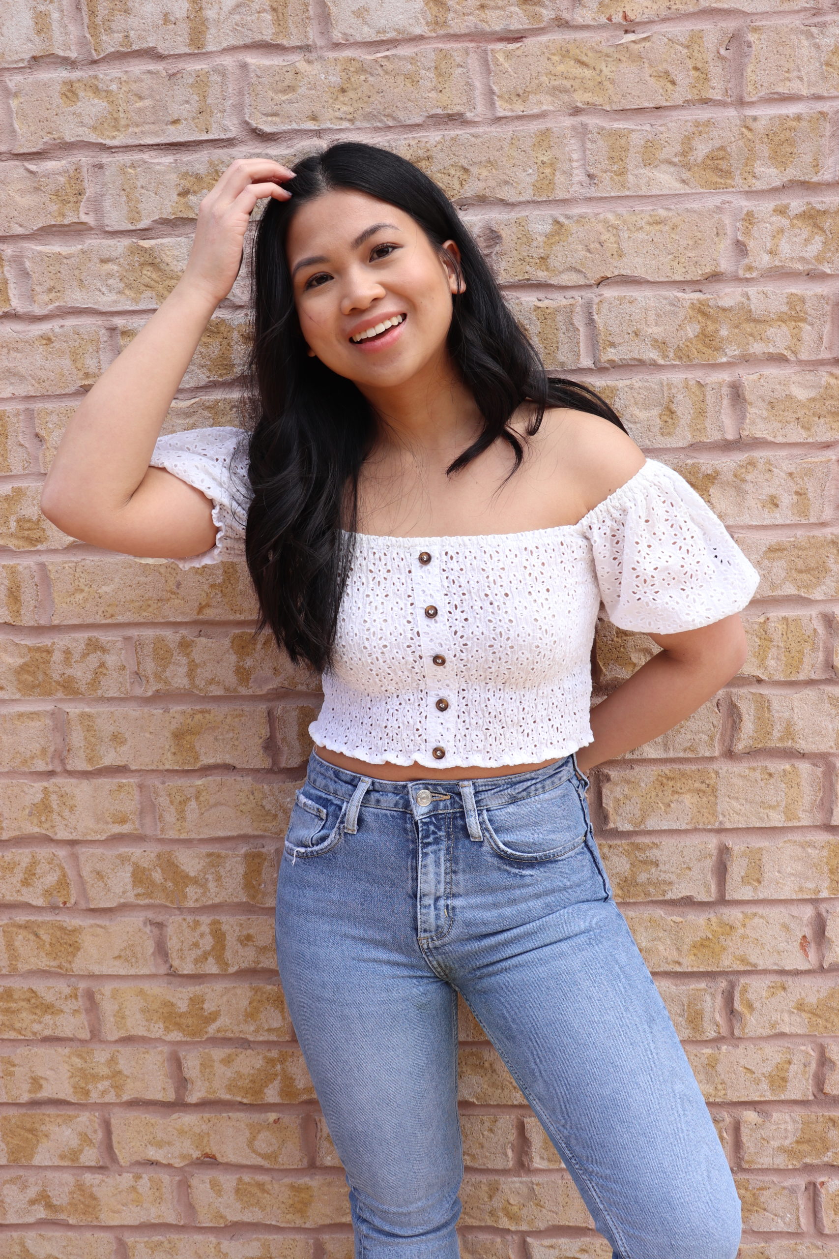 Nathalee Pauline, a student influencer in Toronto, Ontario poses outside