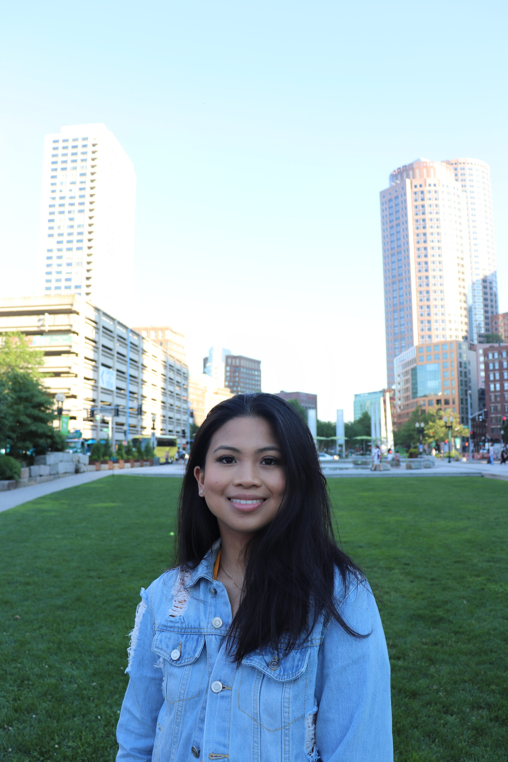 Nathalee Pauline, recent biology graduate, poses outside on the University of Toronto campus