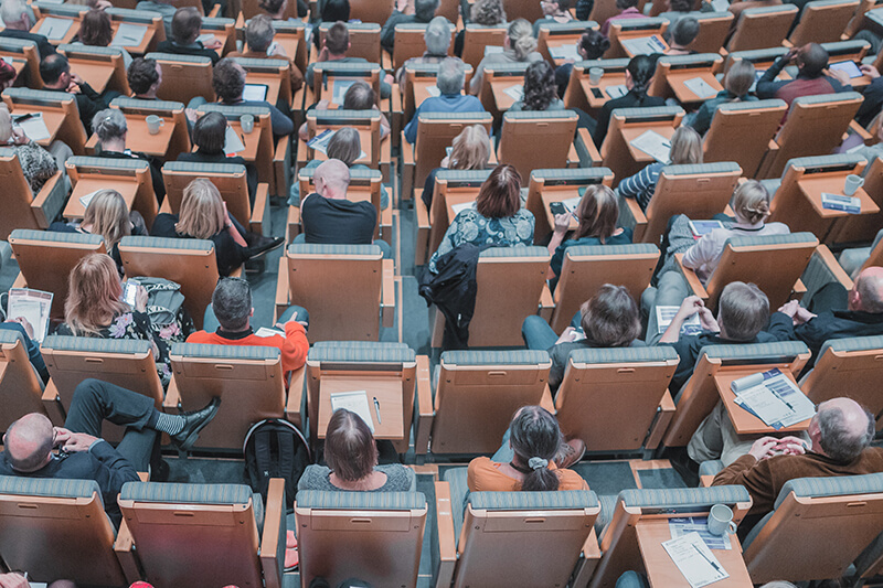 Bird’s eye view of a class of students sitting in a lecture