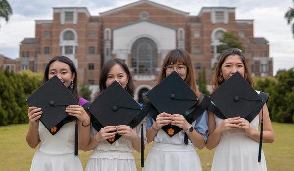 Group of female sorority sisters from Greek life at graduation