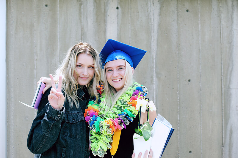 Sorority sisters becoming Greek alumni at their graduation ceremony