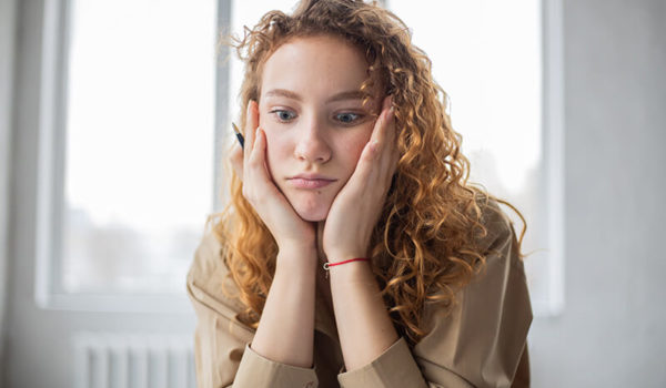 Female student learning how to motivate yourself to get on track at school