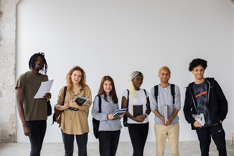 Group of future college students completing their essays