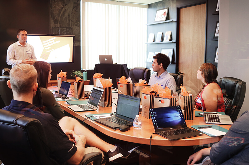 A group of students discussing methodologies