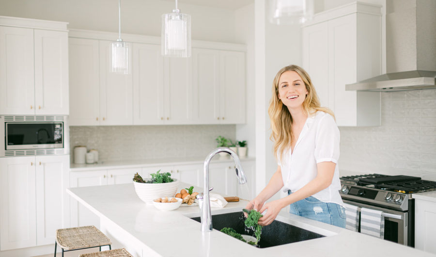 Brittany Ford cooking healthy foods in her kitchen