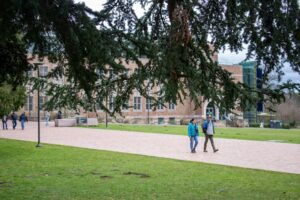 students walking across campus