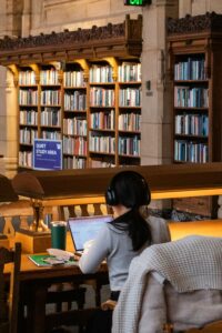 student studying in a library