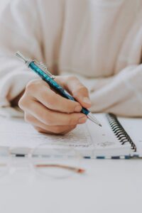 student drafting an academic paper