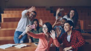 students celebrating successful coursework