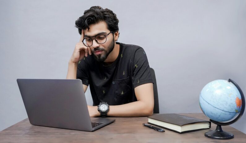 A student verifying AI generated citations against official university library records.