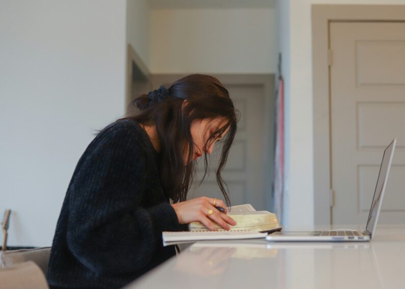 student working on persuasive essay topics