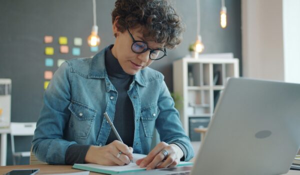 student researching dissertation vs thesis